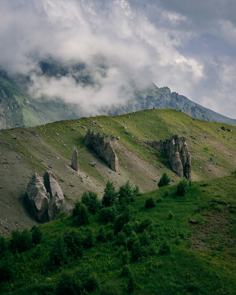 green and white mountain at daytime