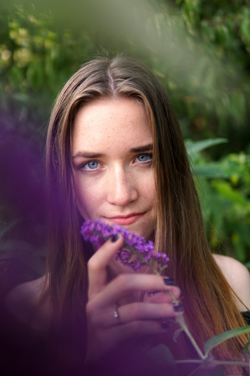 woman holding flower