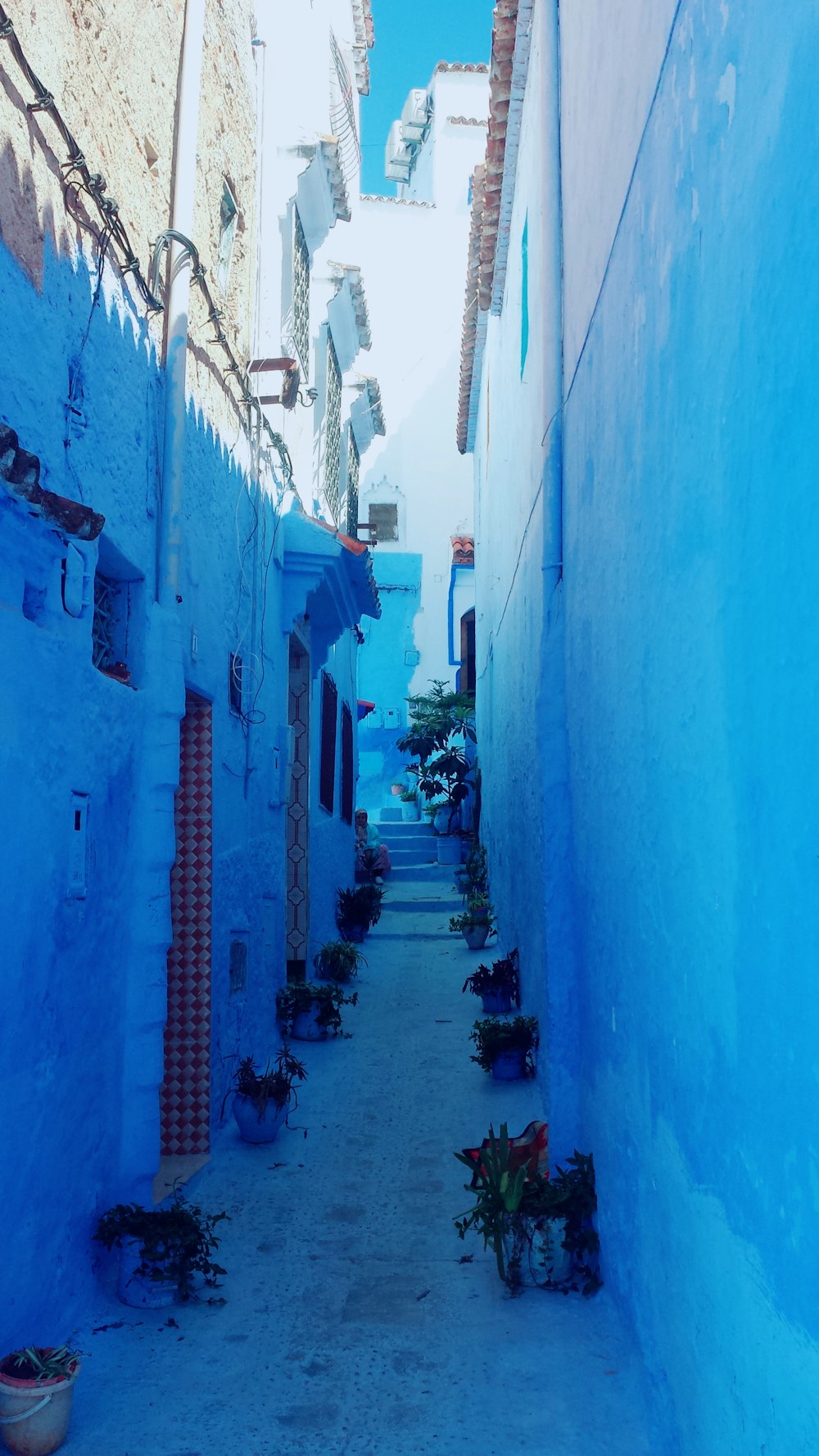 blue and white concrete buildings at daytime