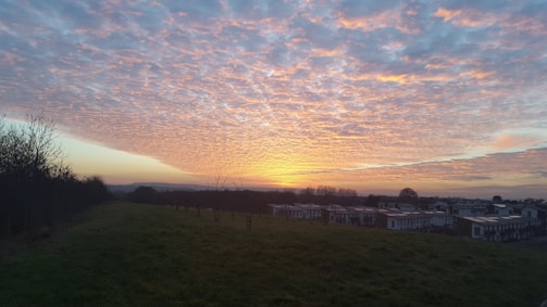A vibrant sunset view of a stunning estate.