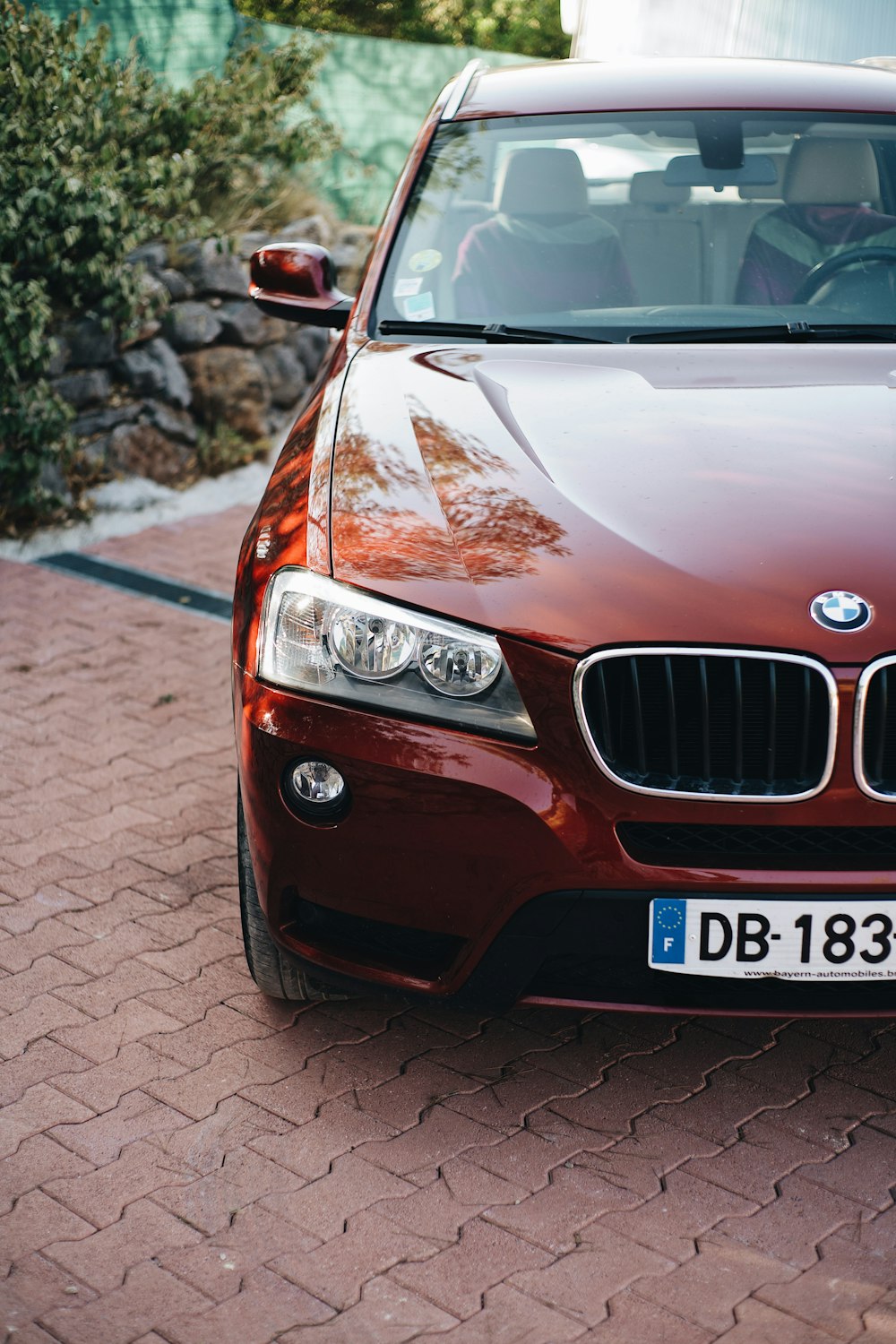 red BMW vehicle