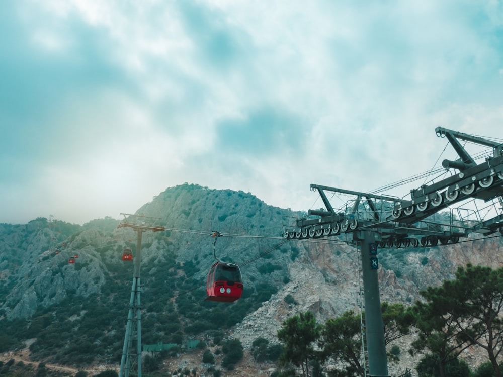 a cable car going up a mountain side