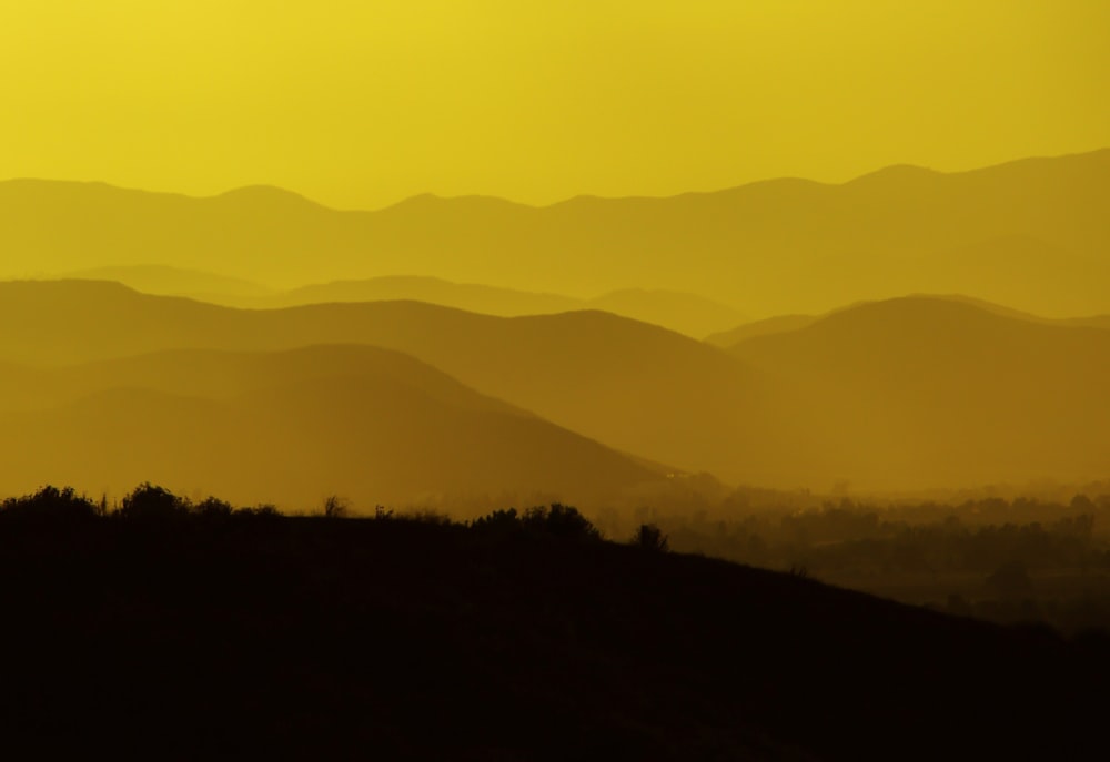 silhouette photo of black mountain ranges