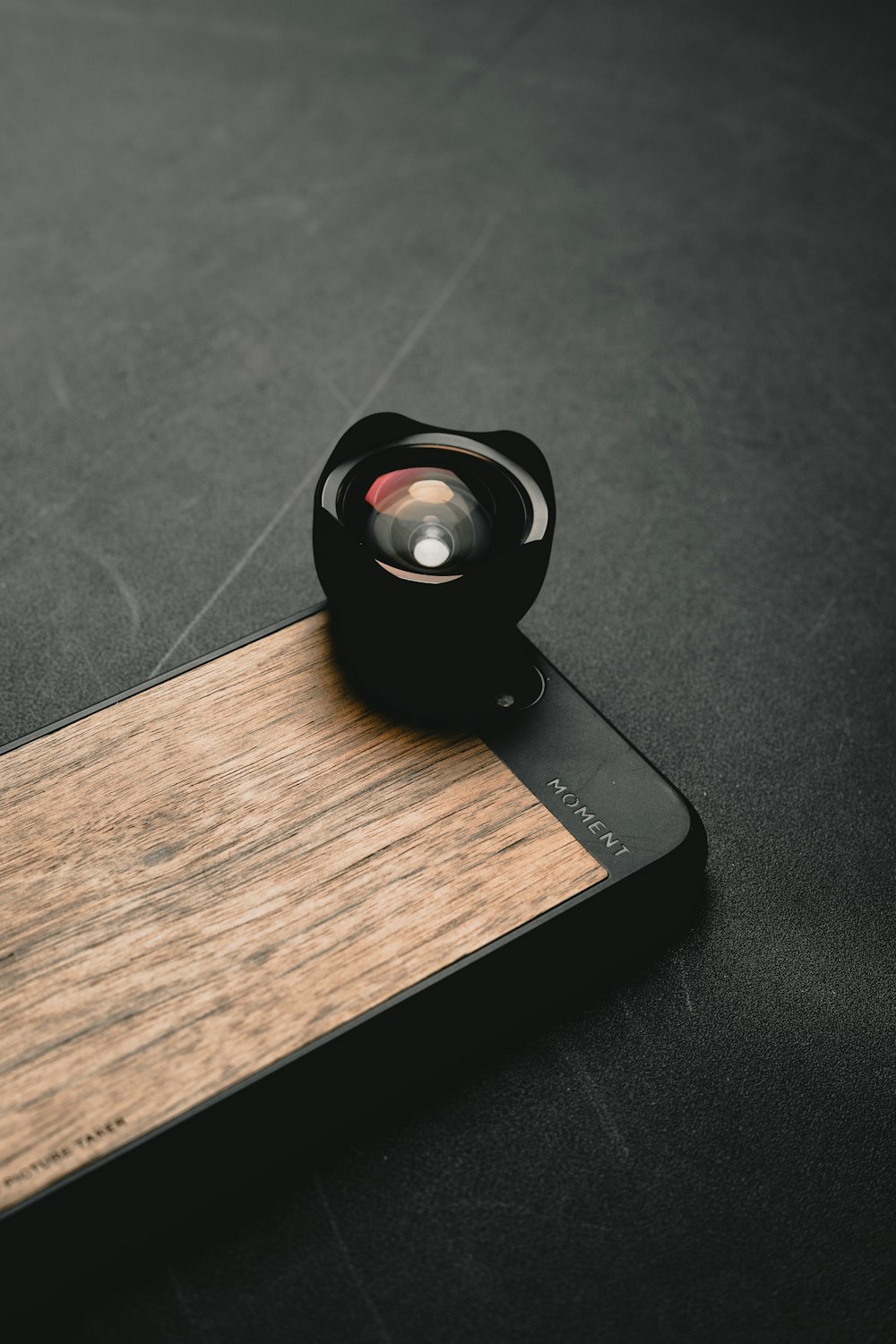 black camera lens on iPhone case