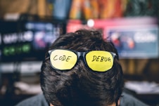 black-framed sunglasses