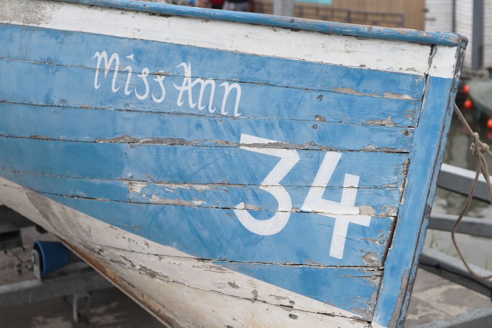 blue and white wooden boat