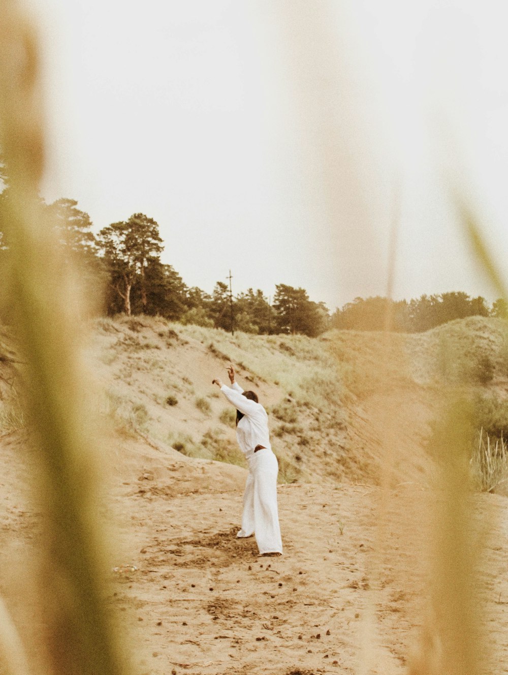 women's white long-sleeved dress during daytime