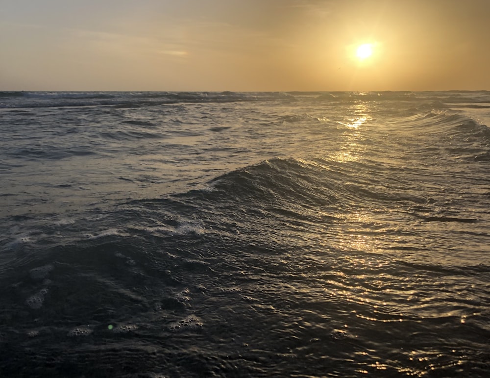 gray sea under sunrise view