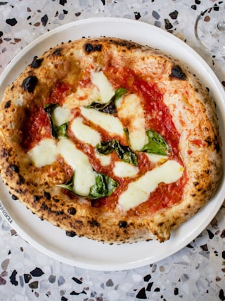 cooked food on round white ceramic plate