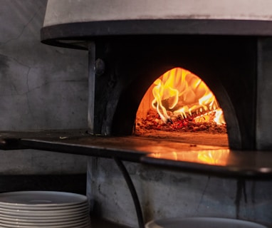 a pizza oven with a pizza inside of it