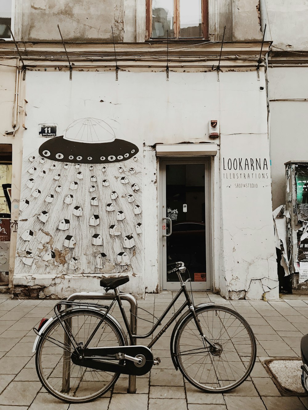 a bicycle parked in front of a building