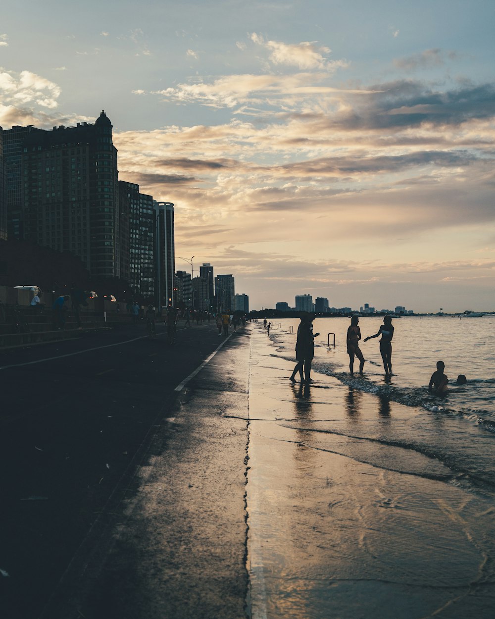 silhouette of people in shore