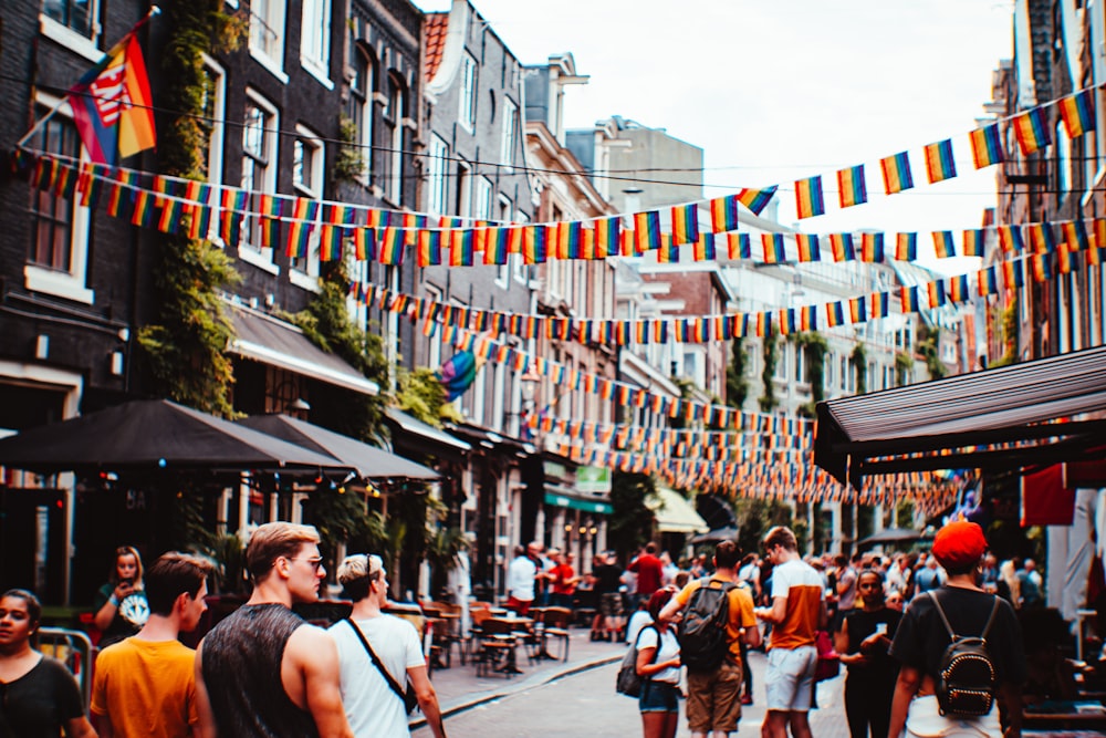 people at the street near buildings