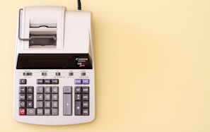 white Canon cash register