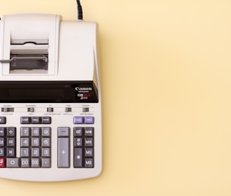 white Canon cash register