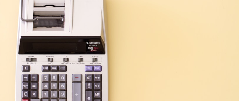 white Canon cash register