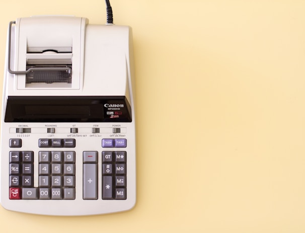 white Canon cash register