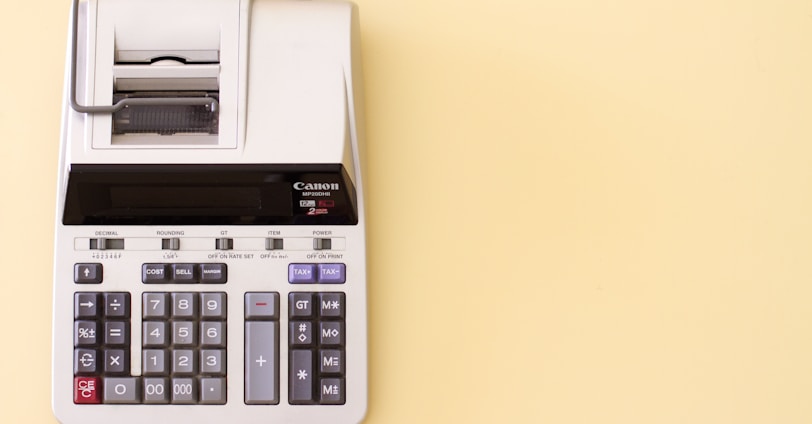 white Canon cash register