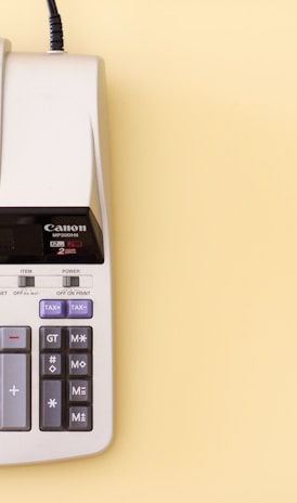 white Canon cash register