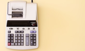 white Canon cash register