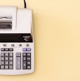 white Canon cash register