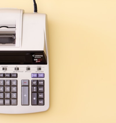 white Canon cash register