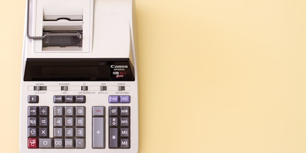 white Canon cash register