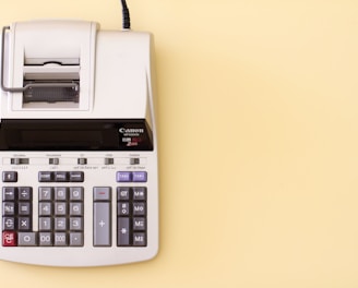 white Canon cash register