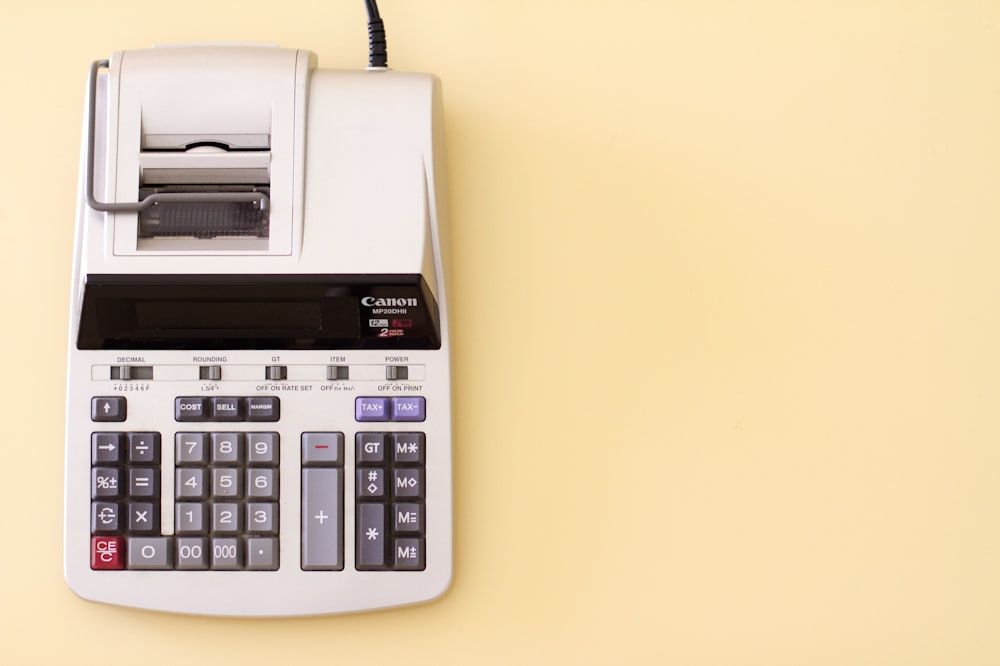 white Canon cash register