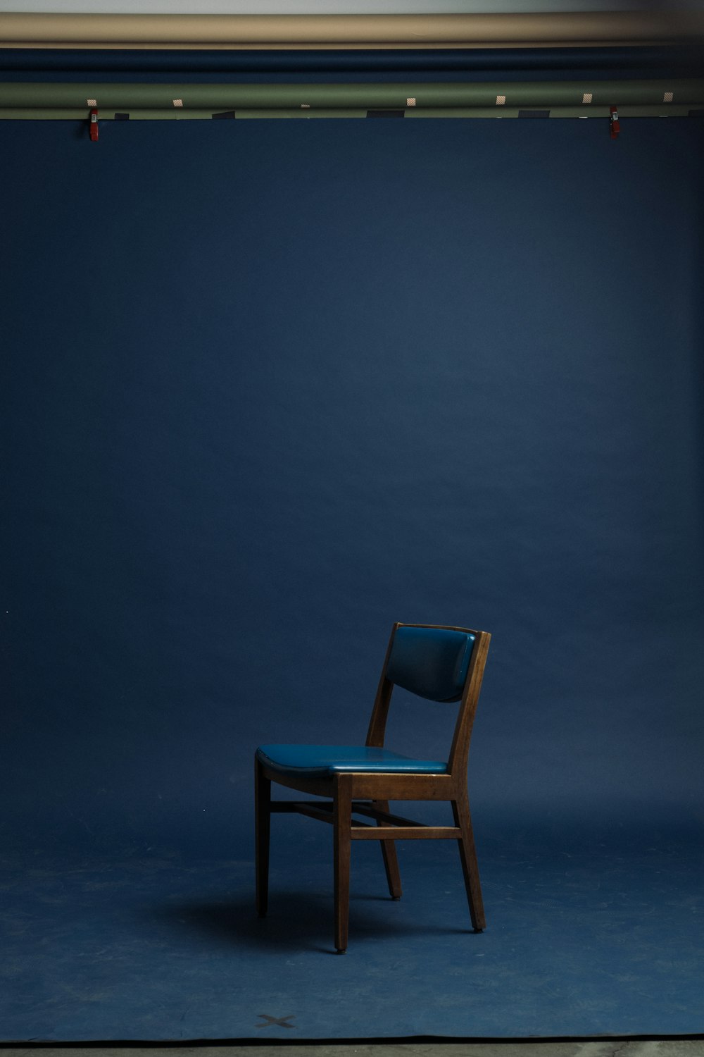 Blue Padded Brown Wooden Armless Chair Photo Free Chair Image On
