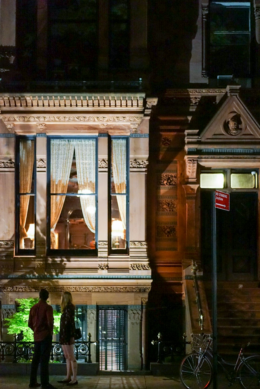 person standing near building