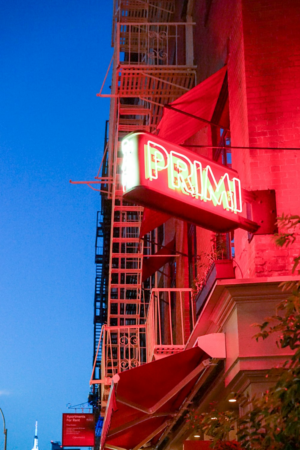 a building with a sign that says prima on it