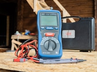 blue and black multimeter