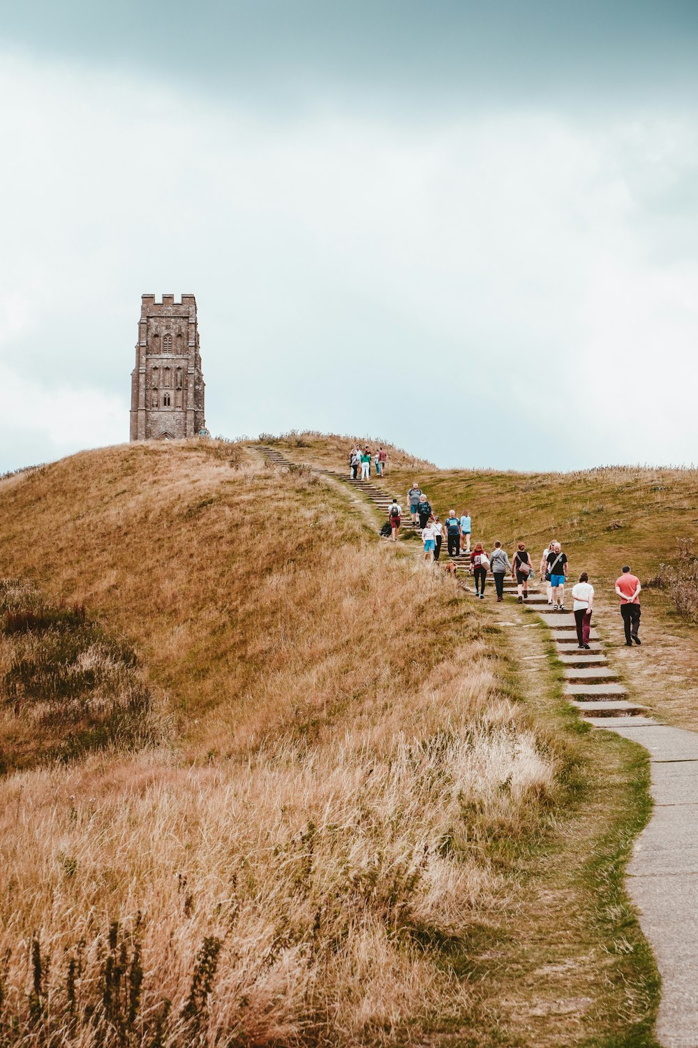 people walking to tower