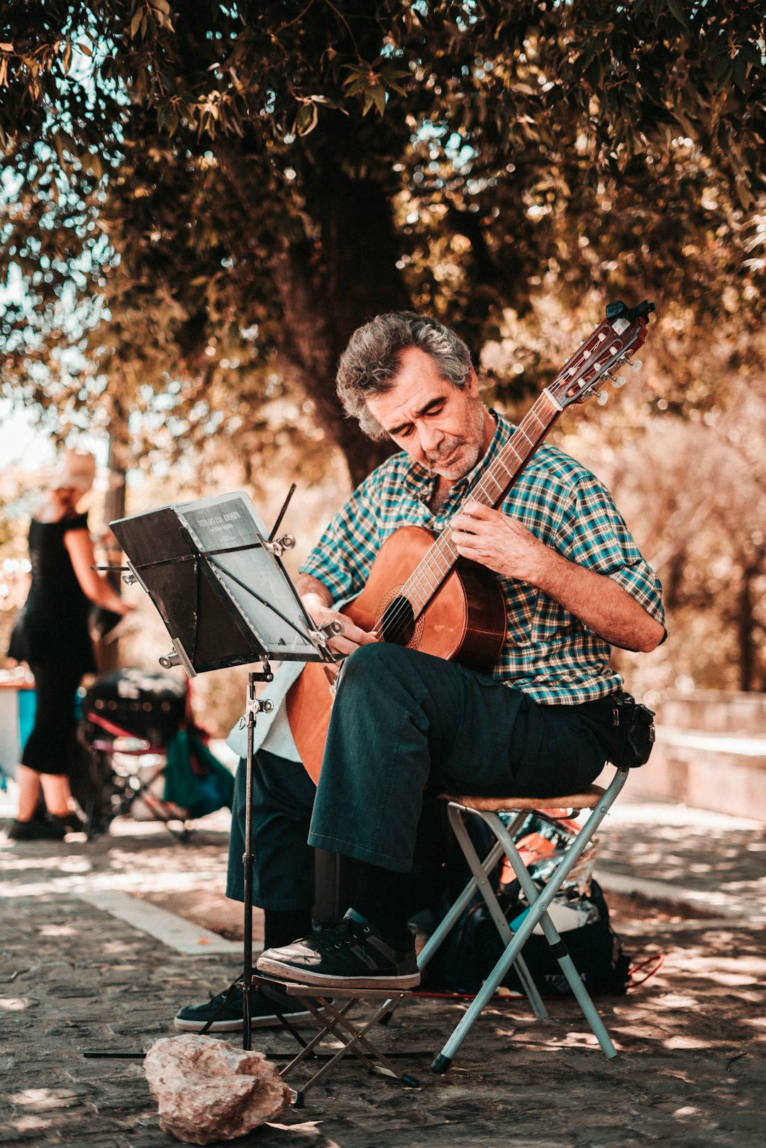 woman playing guitar