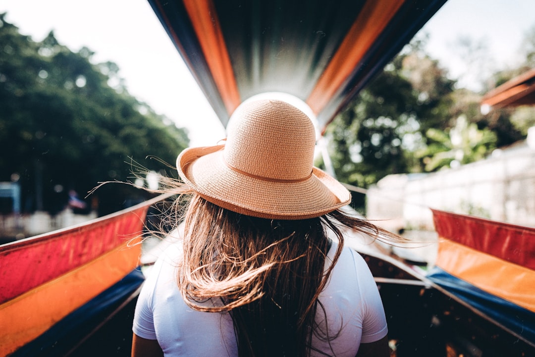 woman wearing beige hat