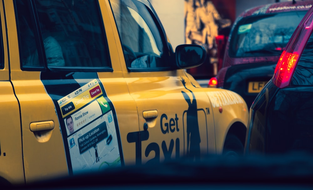 a close up of a taxi cab on a city street