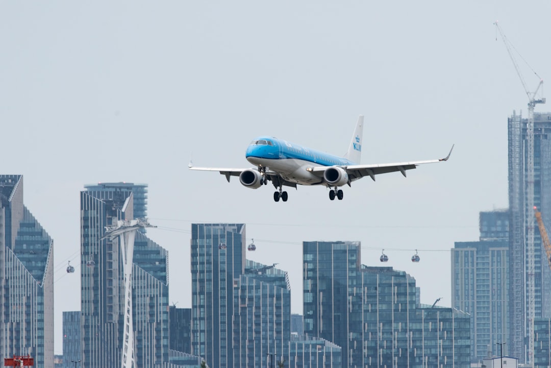 white and blue air liner,