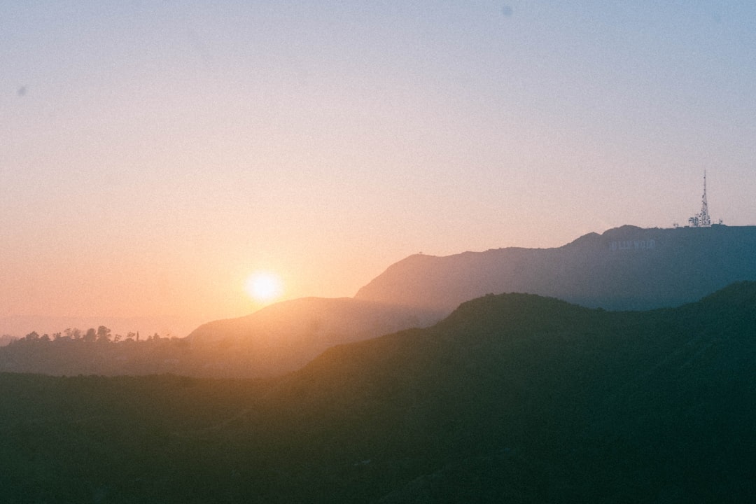 silhouette of mountains during sunset