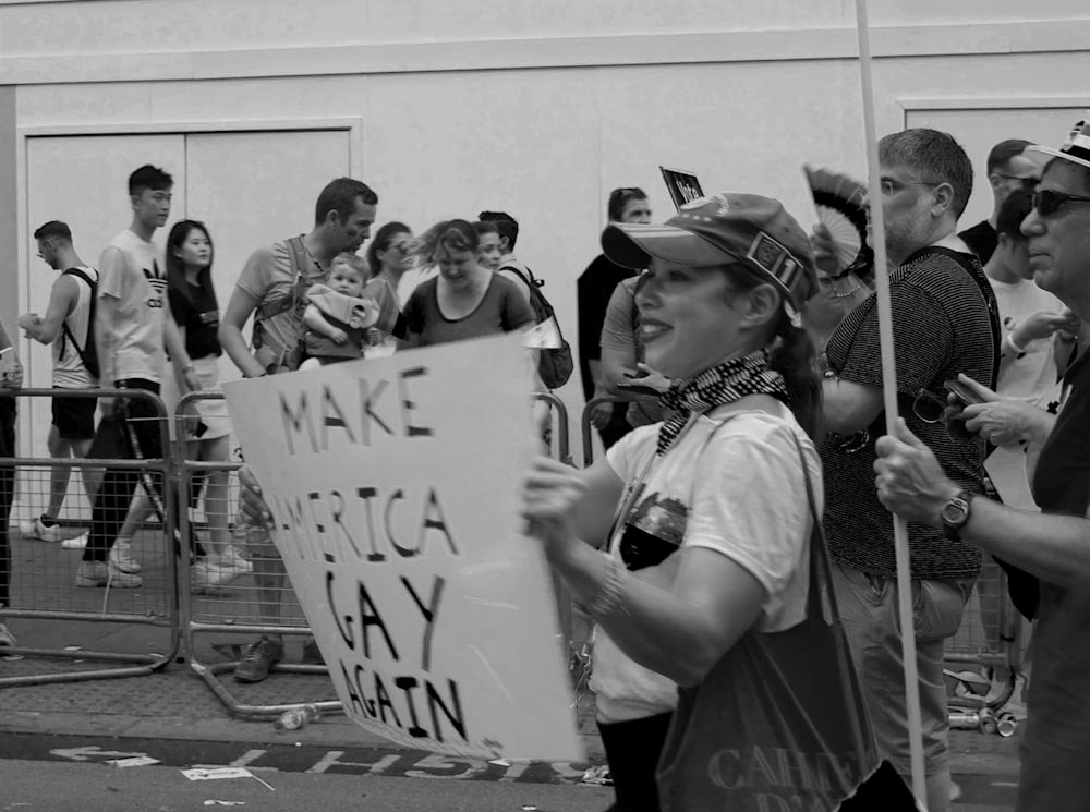 woman holding banner