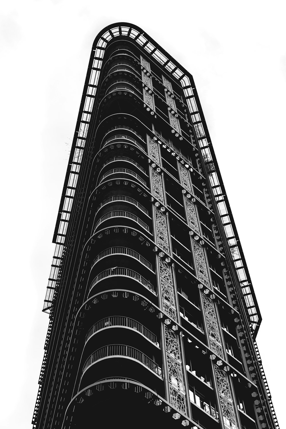 grayscale photography of high-rise building during daytime