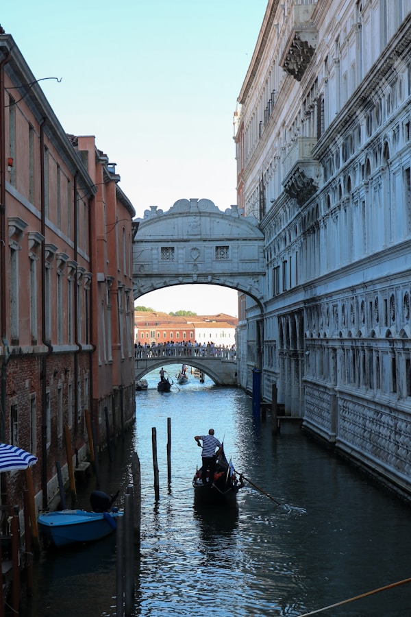 Gondola gliding through a Venice canal
