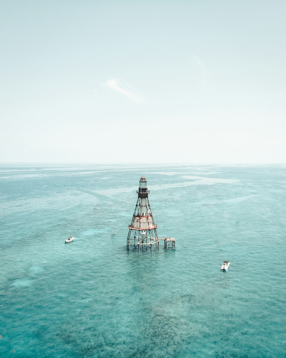 tower on body of water at daytime