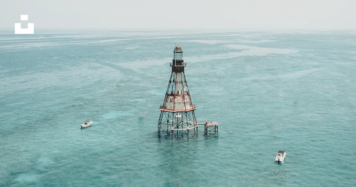 Fowey Rocks Miami Tower on body of water at daytime photo – Free Fowey rocks lighthouse ...