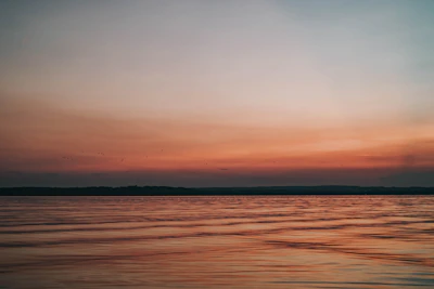 A peaceful sunset with soft colors representing calm and healing energy.