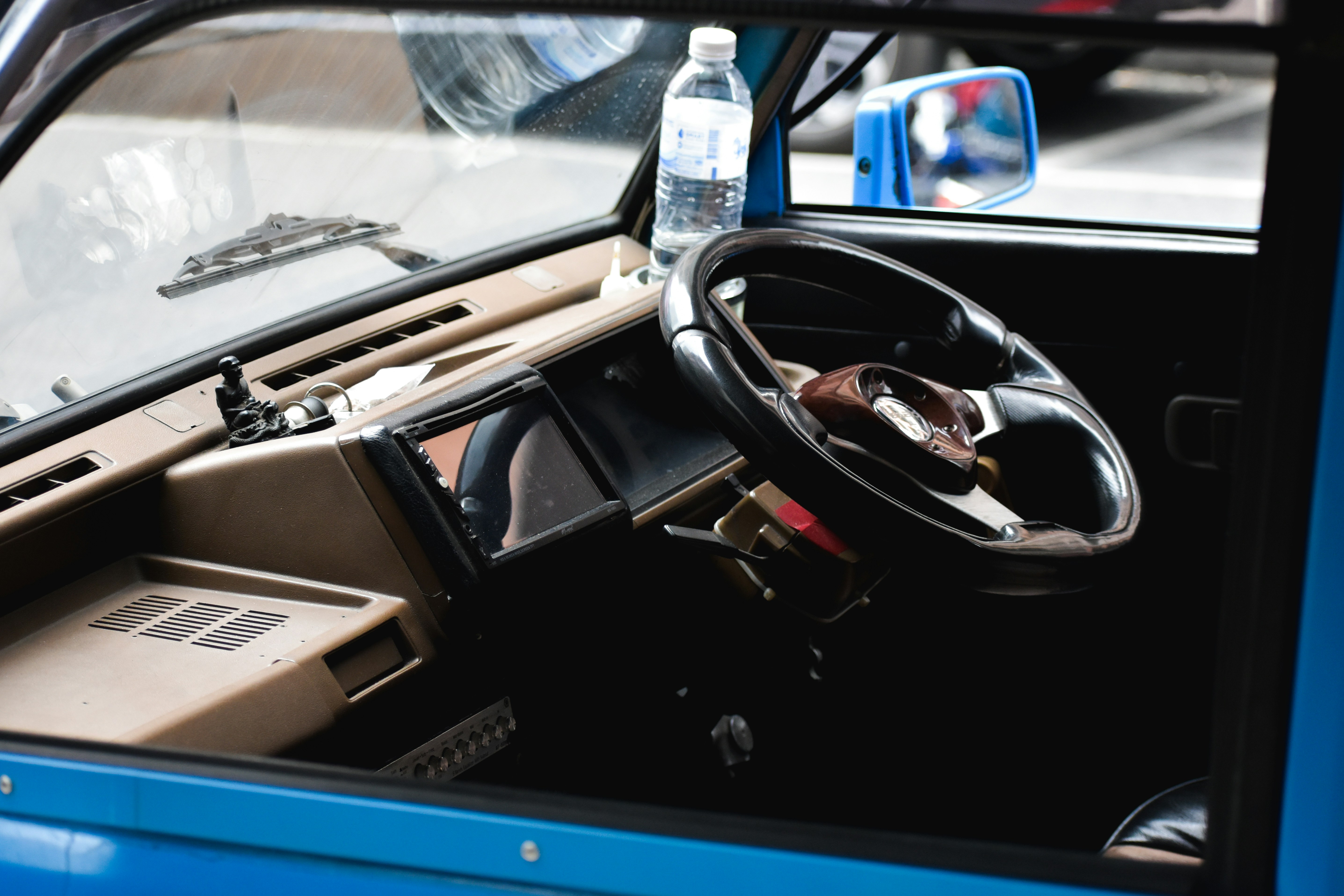 Modern electric pickup interior with large touchscreen and minimalist design