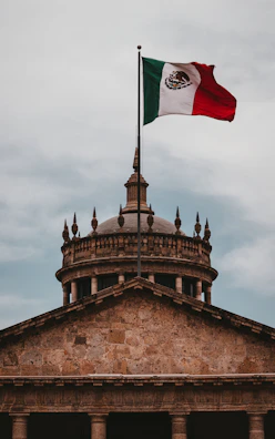 Official building of Secretaría de Educación Pública with flags.