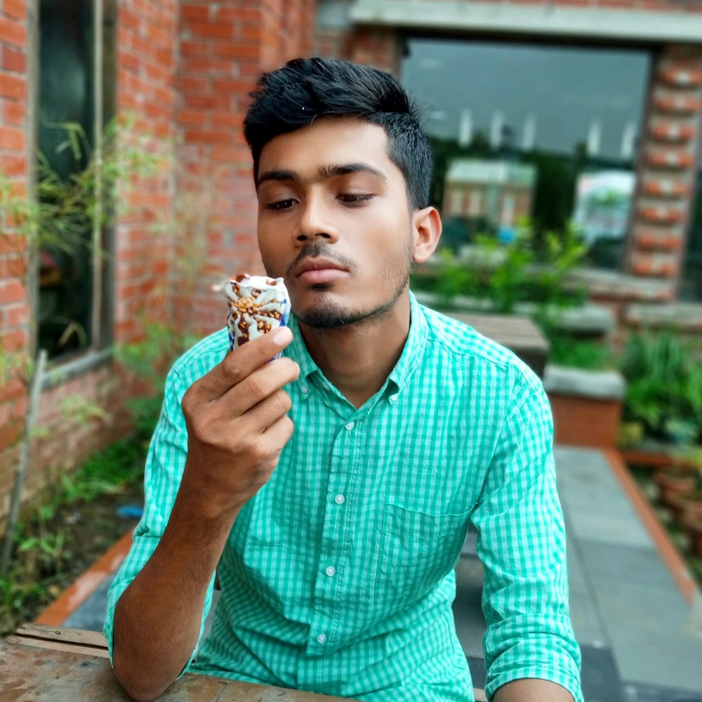 man holding ice cream