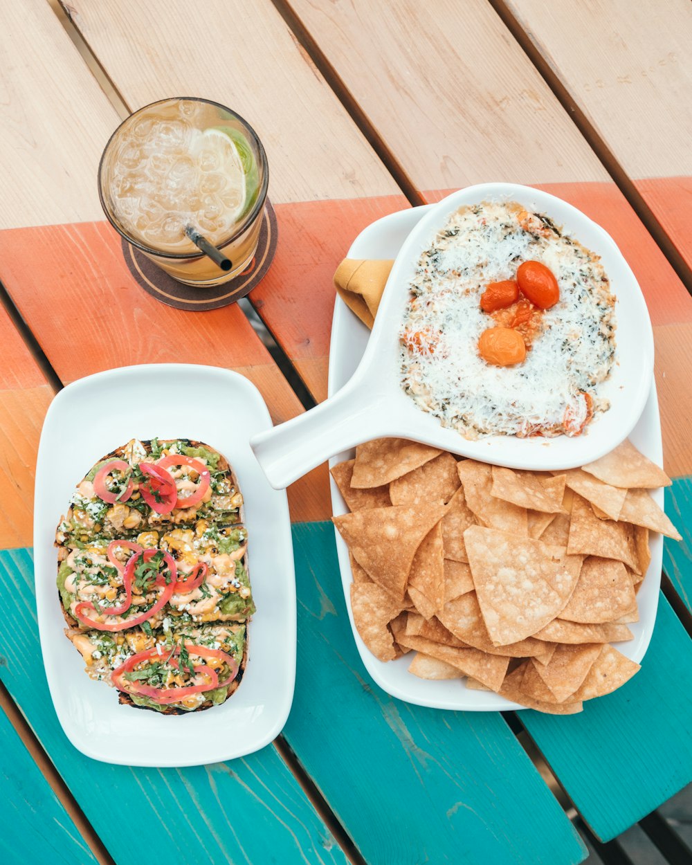 food photography of tortilla chips with white sauce