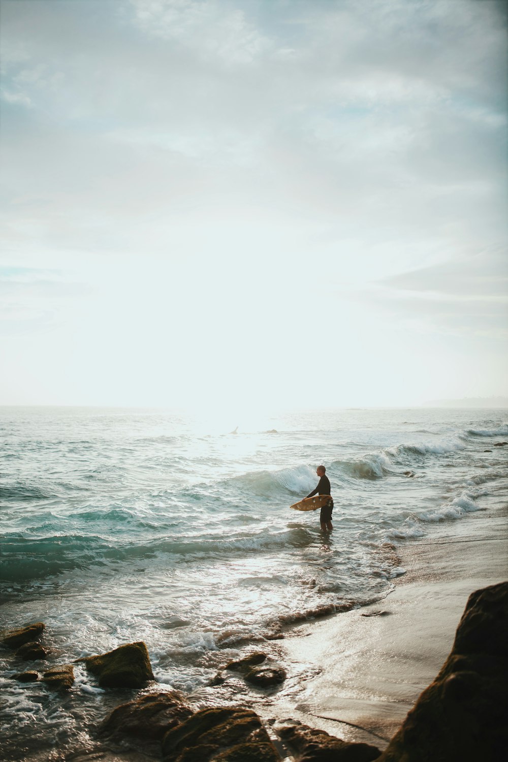 person standing on shore